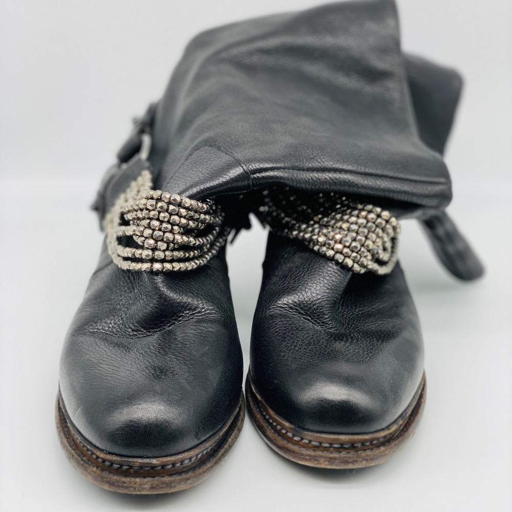 Calf high studded boots